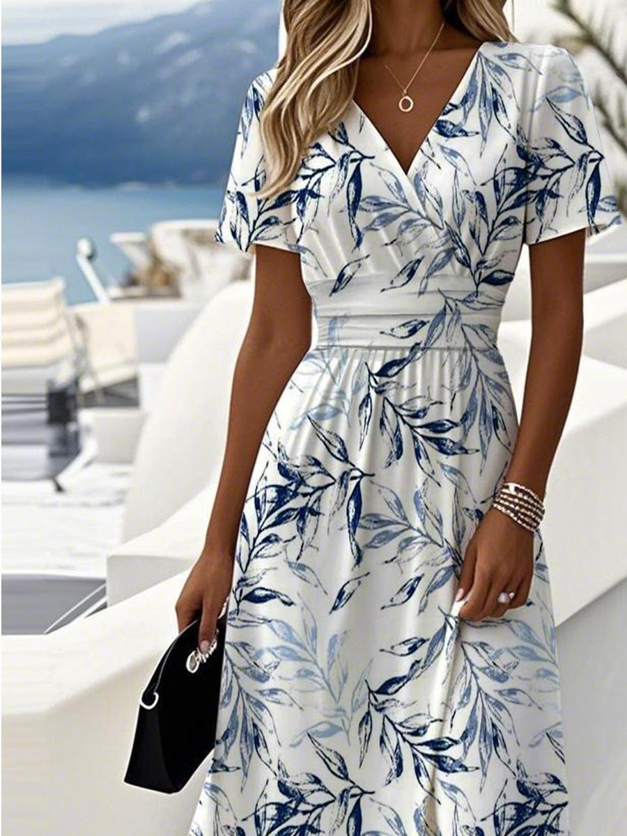 Superbe robe midi d'été pour femme, motif floral et col V. Parfaite pour la mode femme estivale décontractée.