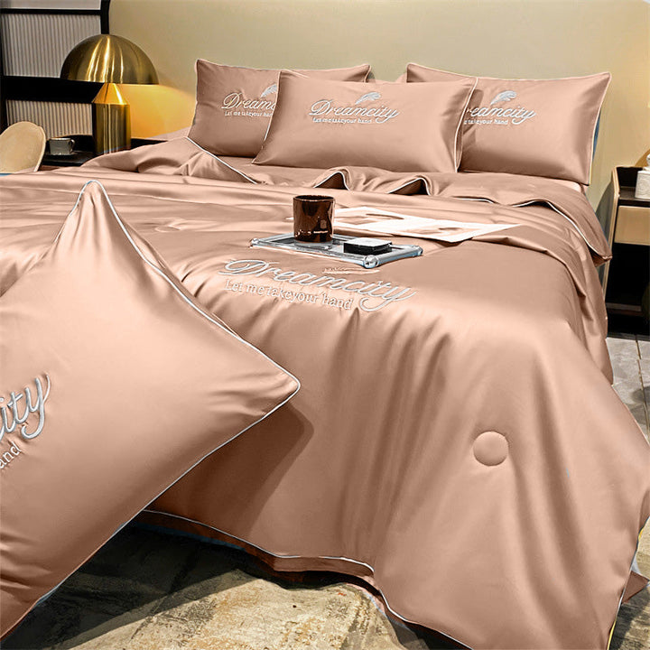 Couette CoolWrap pour l'été: en soie glacée, lavable en machine, douce et respirante.