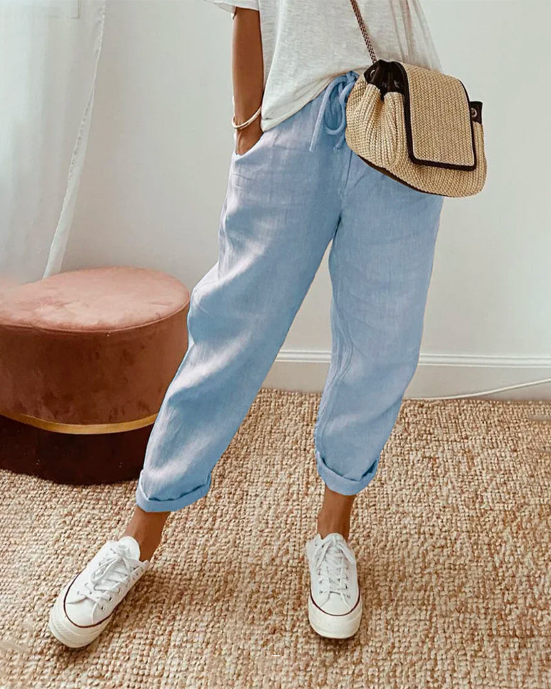 Pantalon femme en lin décontracté, parfait pour un look élégant et confortable, avec taille ajustable.