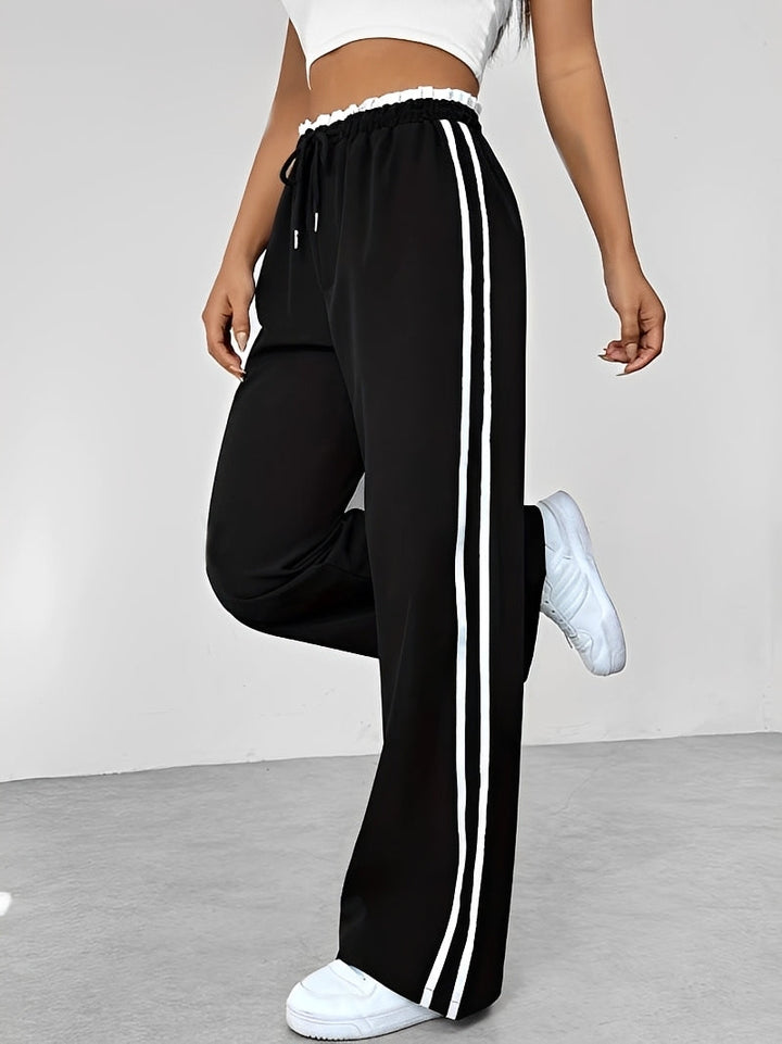 Pantalon femme décontracté streetwear, coupe droite moderne, parfait pour un look quotidien confortable.