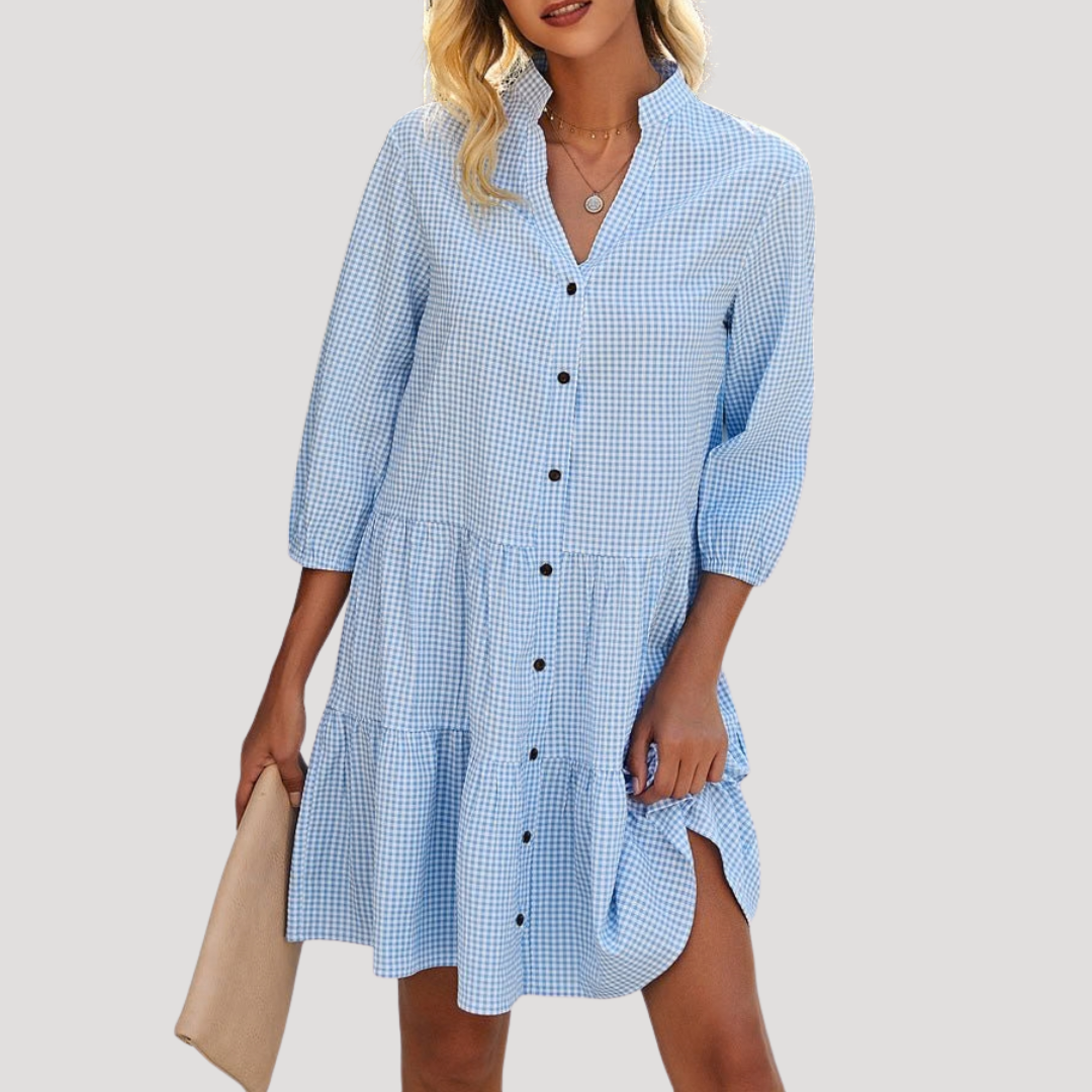 Robe fluide courte vichy pour femme, coupe trapèze élégante. Parfaite pour le printemps et l'été, look journalier.