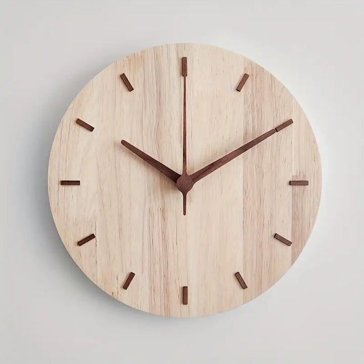Horloge en noyer, design minimaliste et horlogerie de qualité pour un salon ou bureau moderne.