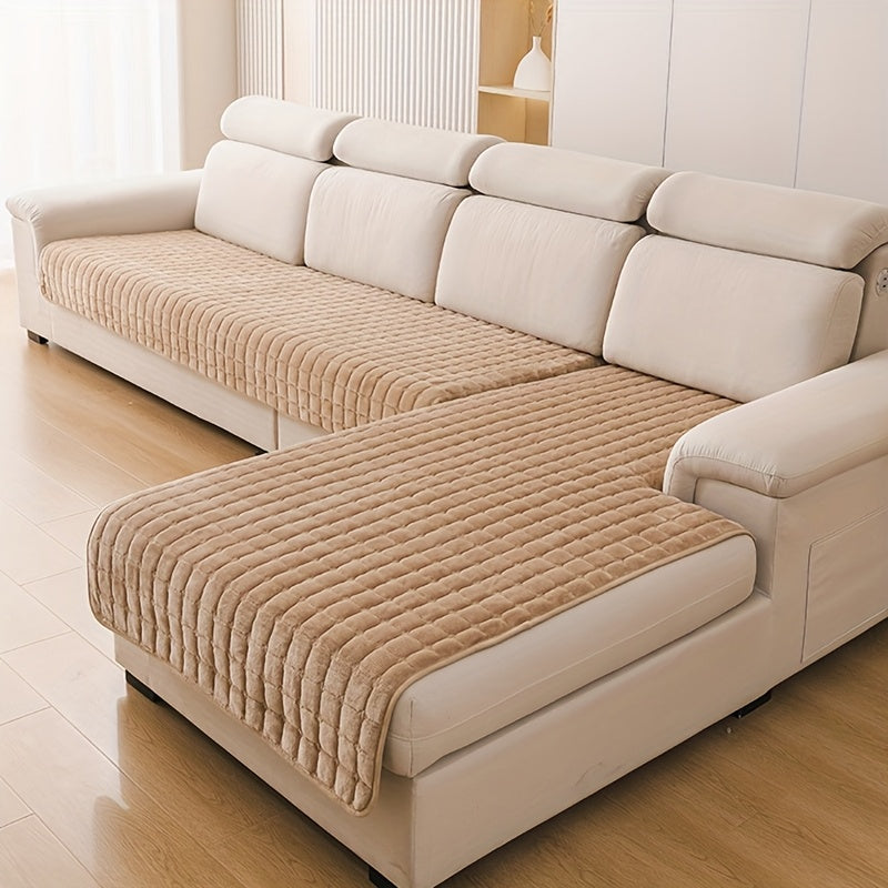 Protection matelassée pour canapé en flanelle rouge bordeaux, ajoute une touche élégante à votre décoration.