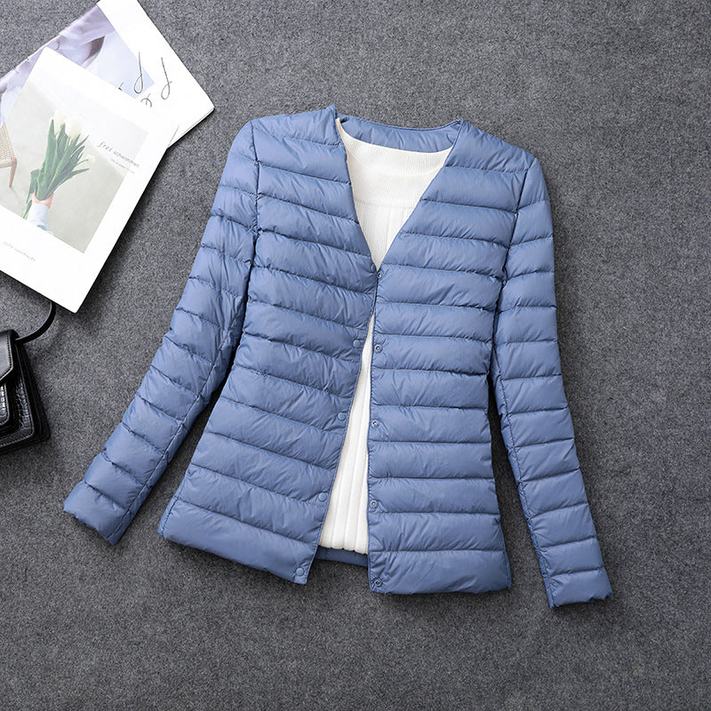 Veste doudoune légère femme, isolante et chaude. Confort décontracté à col rond pour automne-hiver.