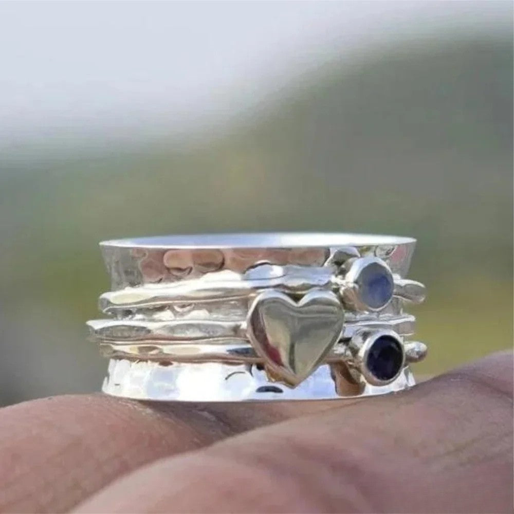 Bague spinner femme élégante avec cœur, bijou anti-stress et mode.