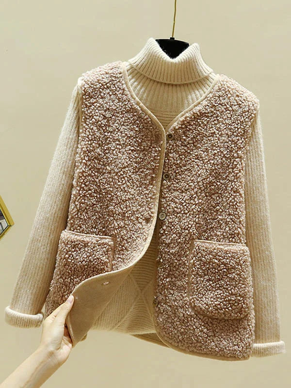 Gilet femme chic sans manches, parfait pour une tenue urbaine ou décontractée automne/hiver.