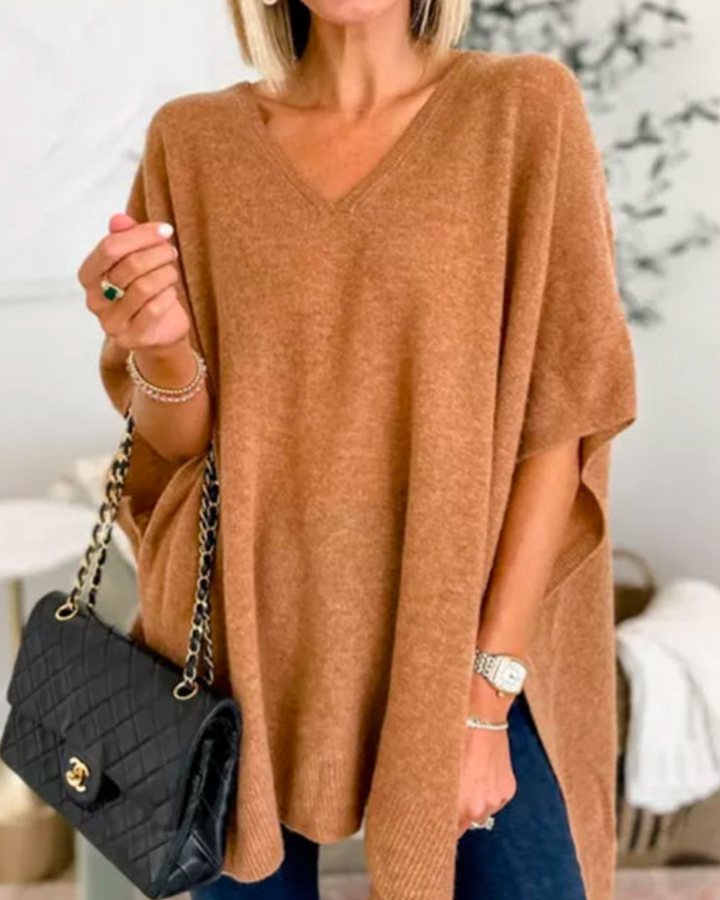 Pull femme chaud et confortable avec col V ample, idéal pour l'hiver élégant.