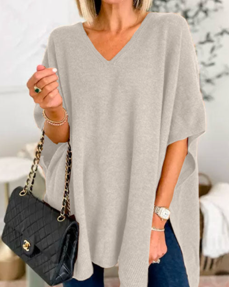 Pull doux et chaud pour femme, style ample et col V, idéal pour la mode hivernale élégante.