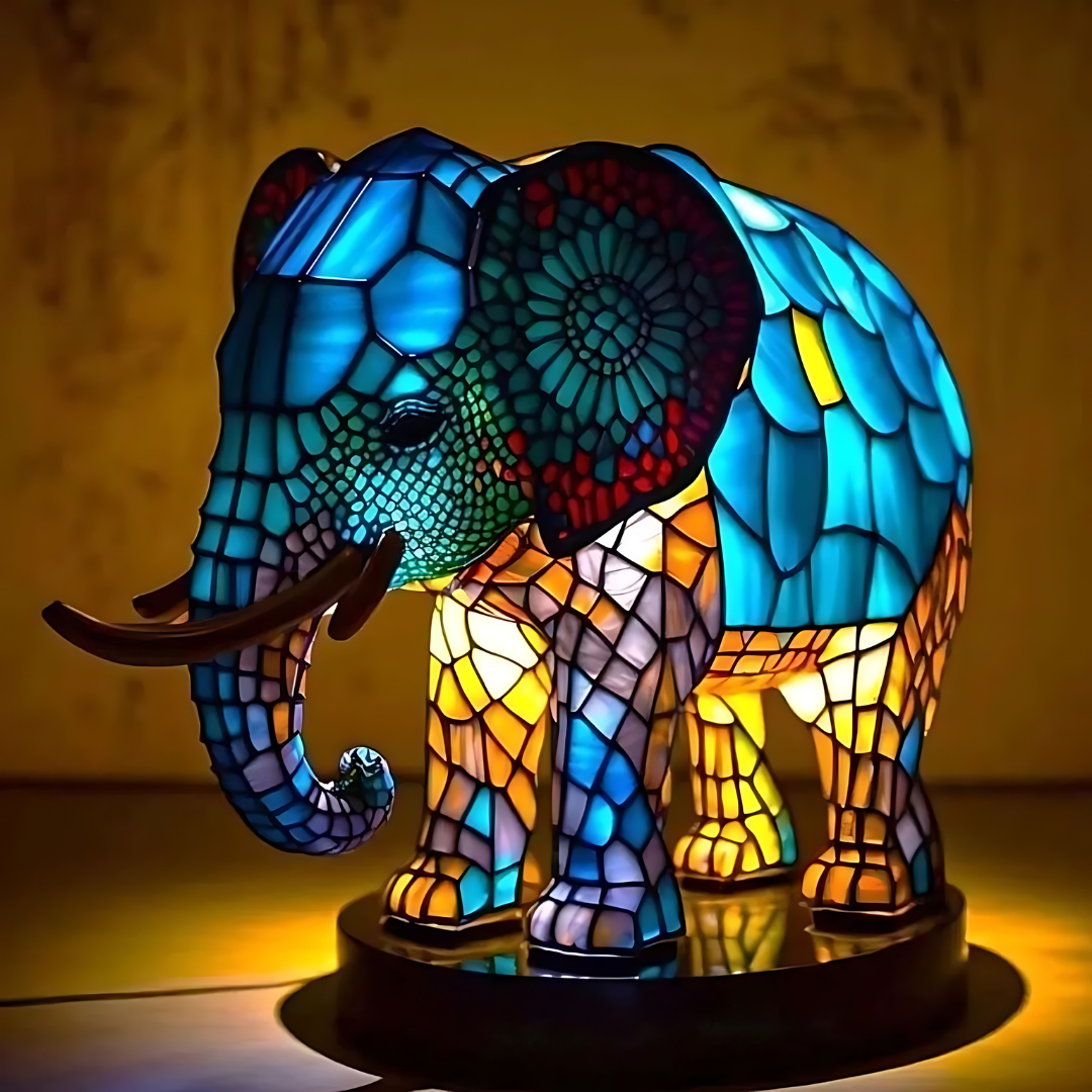 Lampe de table design Glamora en verre soufflé, avec lumière LED dimmable, parfaite pour une décoration contemporaine.