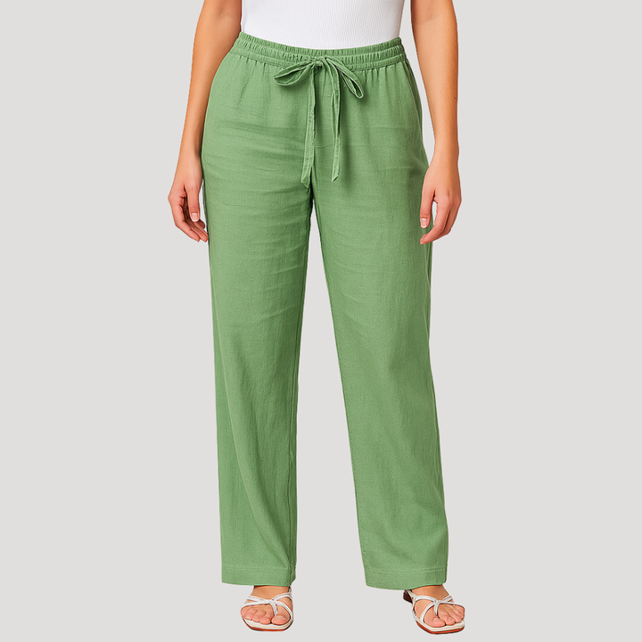 Pantalon femme en lin fluide et léger. Parfait pour l'été, look décontracté ou élégant. Confortable, taille élastique.