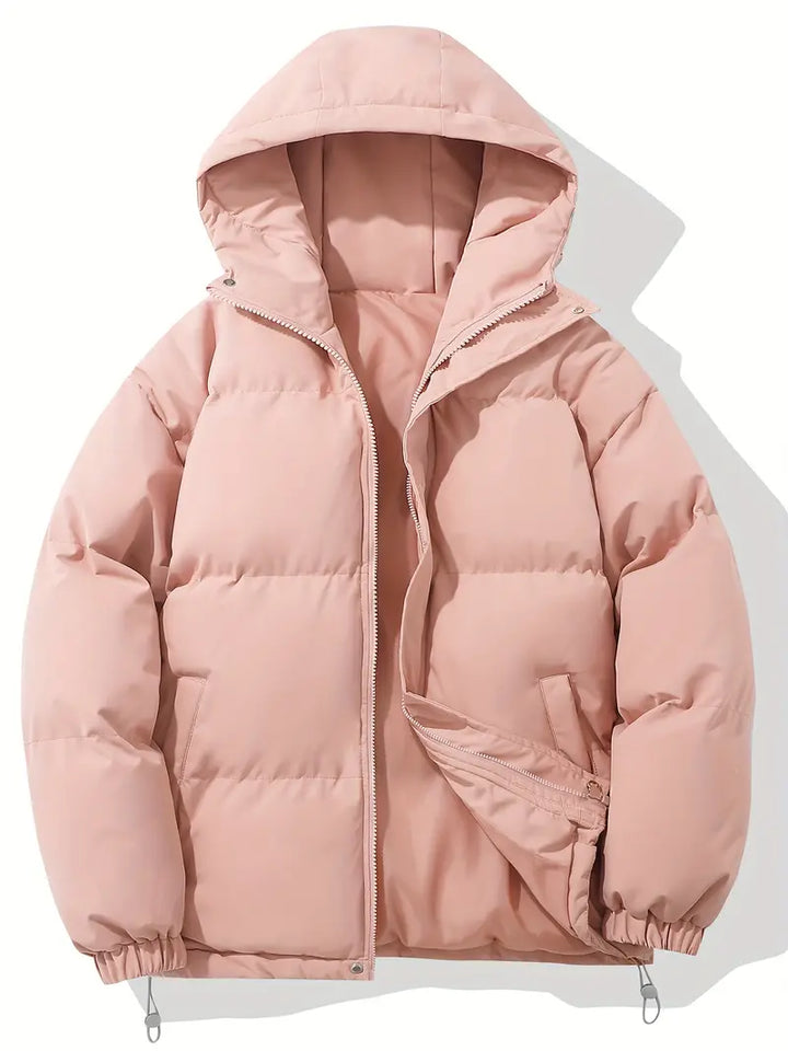 Veste d'hiver matelassée avec capuche, essentielle pour l'homme moderne recherchant confort et allure.