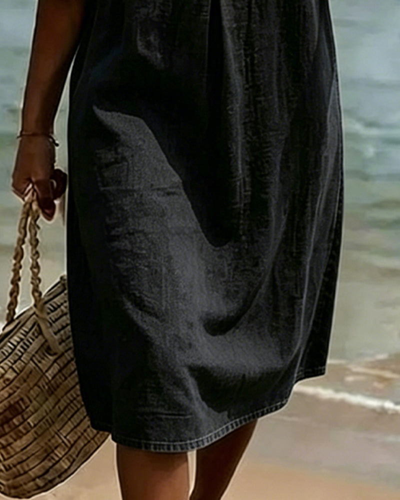 Robe estivale femme, coupe trapèze fluide, manches courtes volantées. Confort et style assurés.