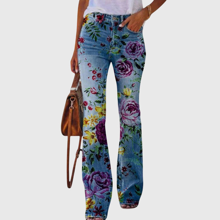 Pantalon élégant femme évasé à fleurs, ultra confortable, motif printanier-estival, look chic décontracté.