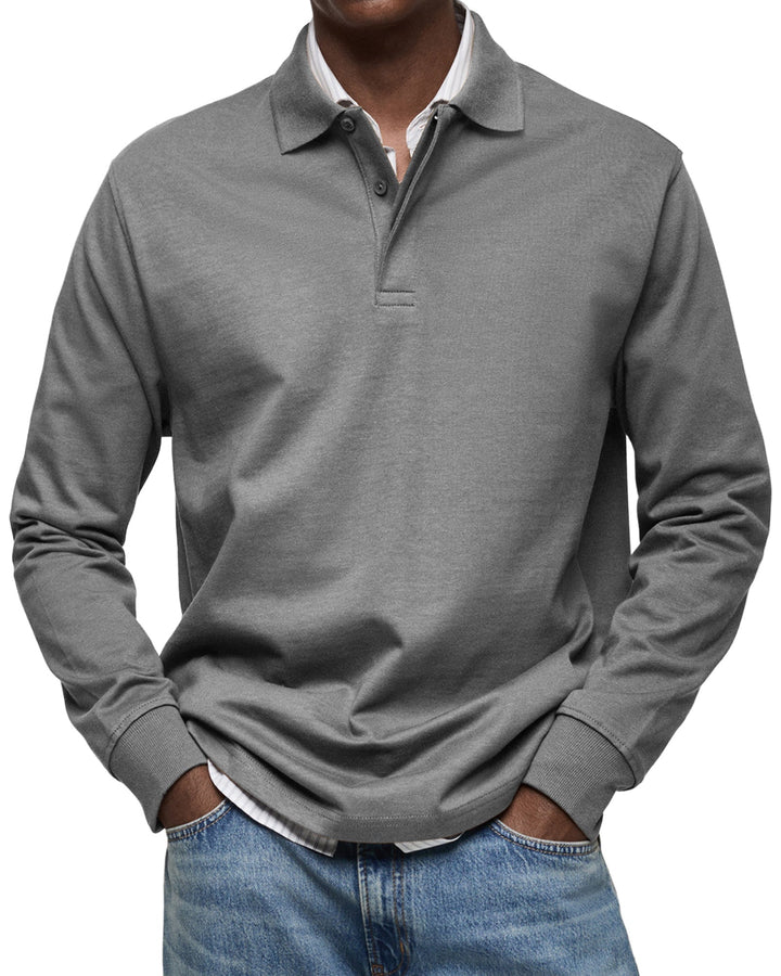 Mode homme : Chemise polo élégante à manches longues, coupe moderne, offrant confort et style raffiné.