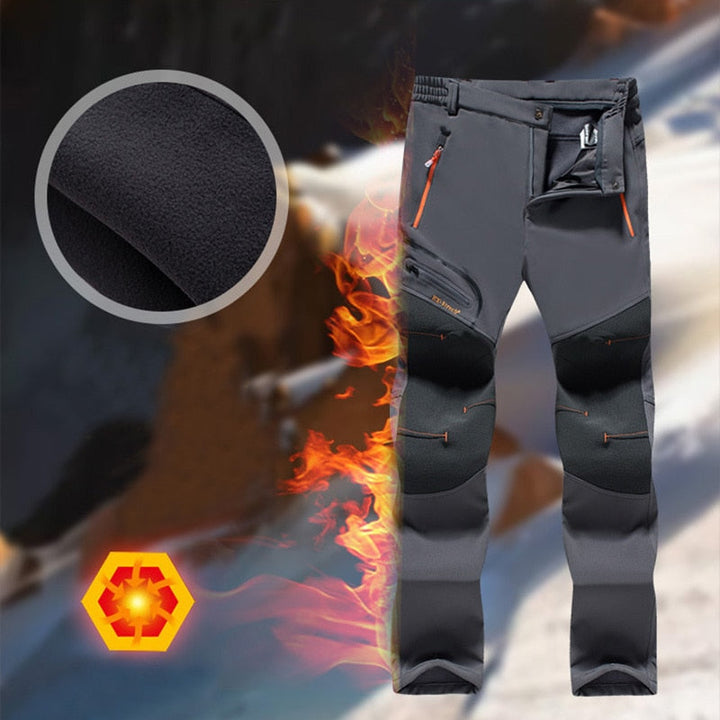 Tenue hivernale homme chaude et imperméable, coupe-vent pour activités outdoor robustes.