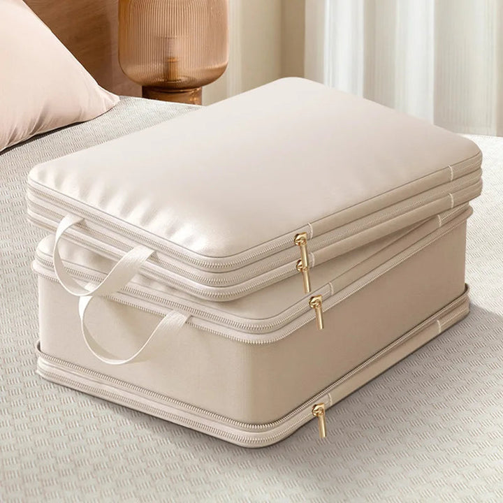 Sac de voyage compressible, optimisant l'espace dans la valise. Idéal pour ranger vêtements et textiles de façon compacte.
