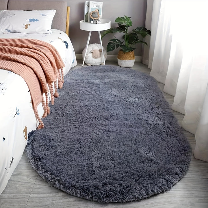 Tapis de chambre ovale en polyester lavable, doux, moelleux et très décoratif.