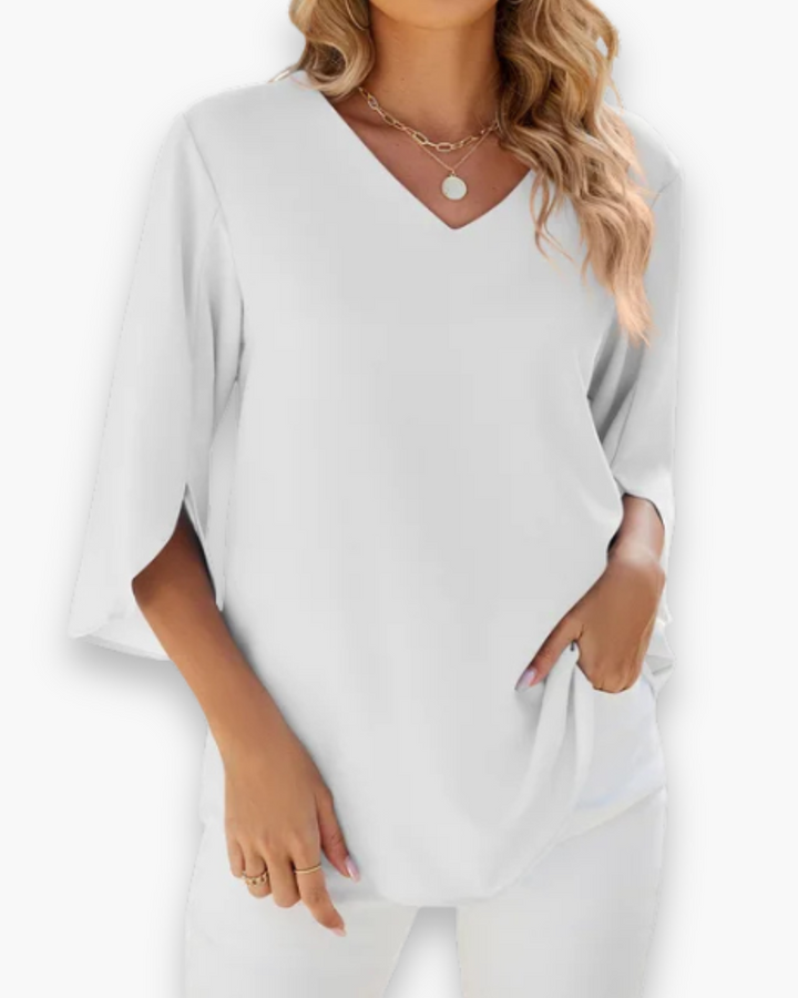 Blouse-chemise femme élégante col V, mode printemps-été, look polyvalent et moderne.