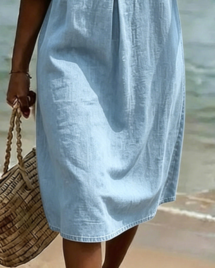 Robe élégante et fluide pour femme, style estival, avec manches volantées. Parfaite pour le printemps.
