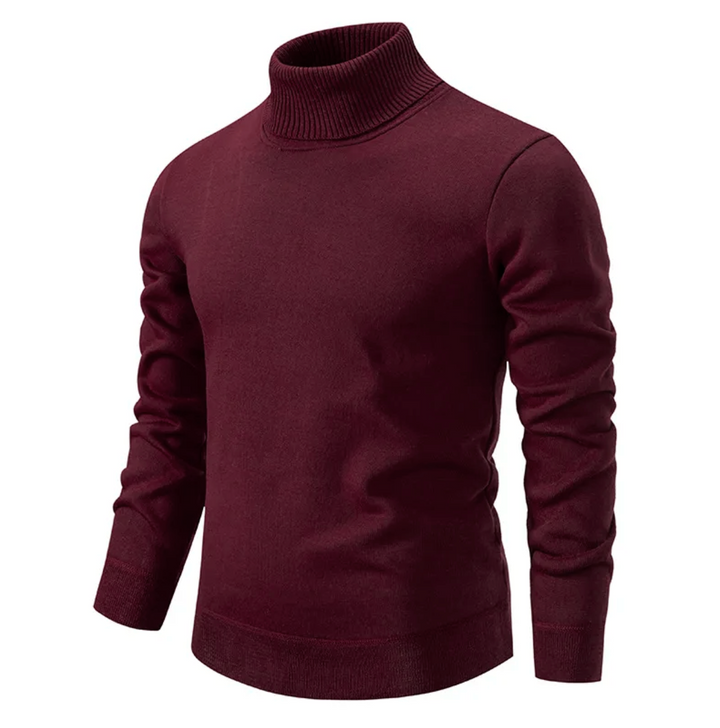 Homme en pull col roulé et jean. Look hivernal décontracté chic, vêtement chaud et confortable pour la mode masculine.
