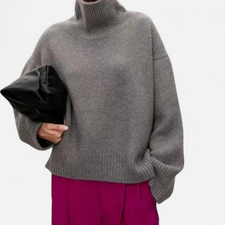 Pull femme col roulé au confort doux, maille chaude. Un basique chic et élégant pour la mode quotidienne d'hiver.