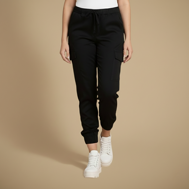 Pantalon cargo jogging femme beige. Décontracté, urbain, cordons de serrage, poches latérales pour look streetwear.