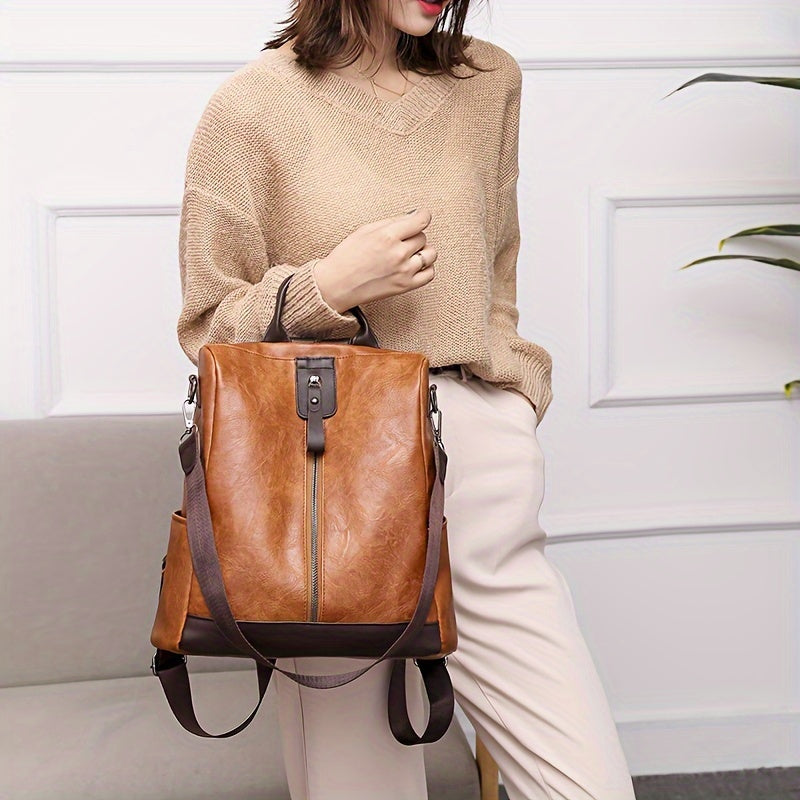Sac à dos vert femme antivol, cuir végétalien PU, couleur tendance pour un style urbain et sécurisé.