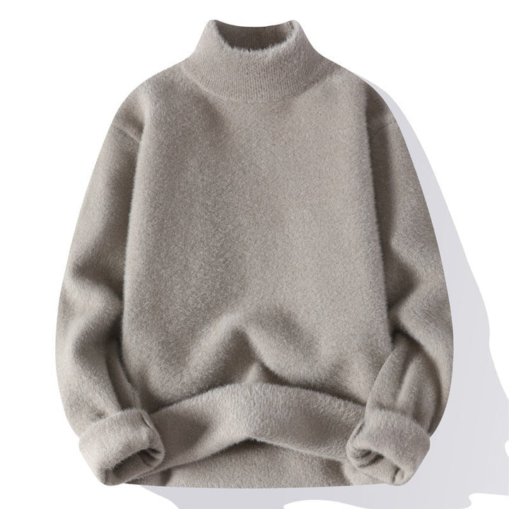 Pull homme moderne semi-transparent, coupe confortable. Idéal pour le confort hivernal et un style décontracté chic.