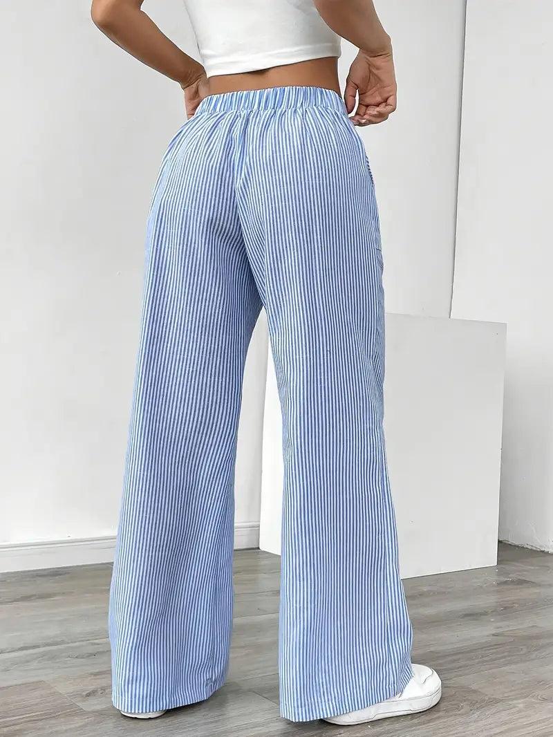 Pantalon femme chic, rayures, coupe large et agréable à porter.