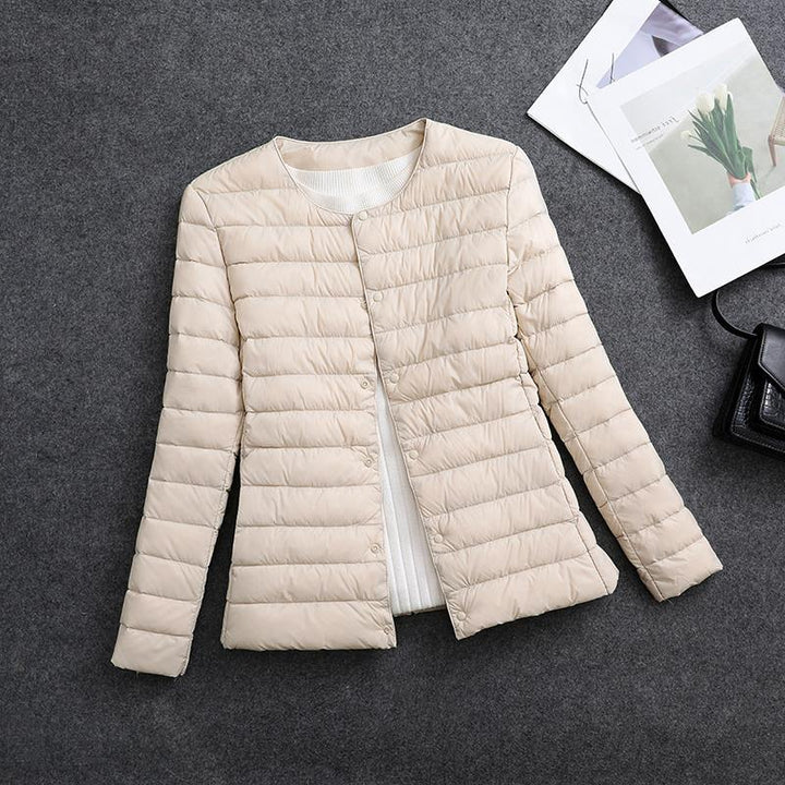 Veste femme isolante col rond, douce et légère. Confort et chaleur pour les journées automne-hiver.