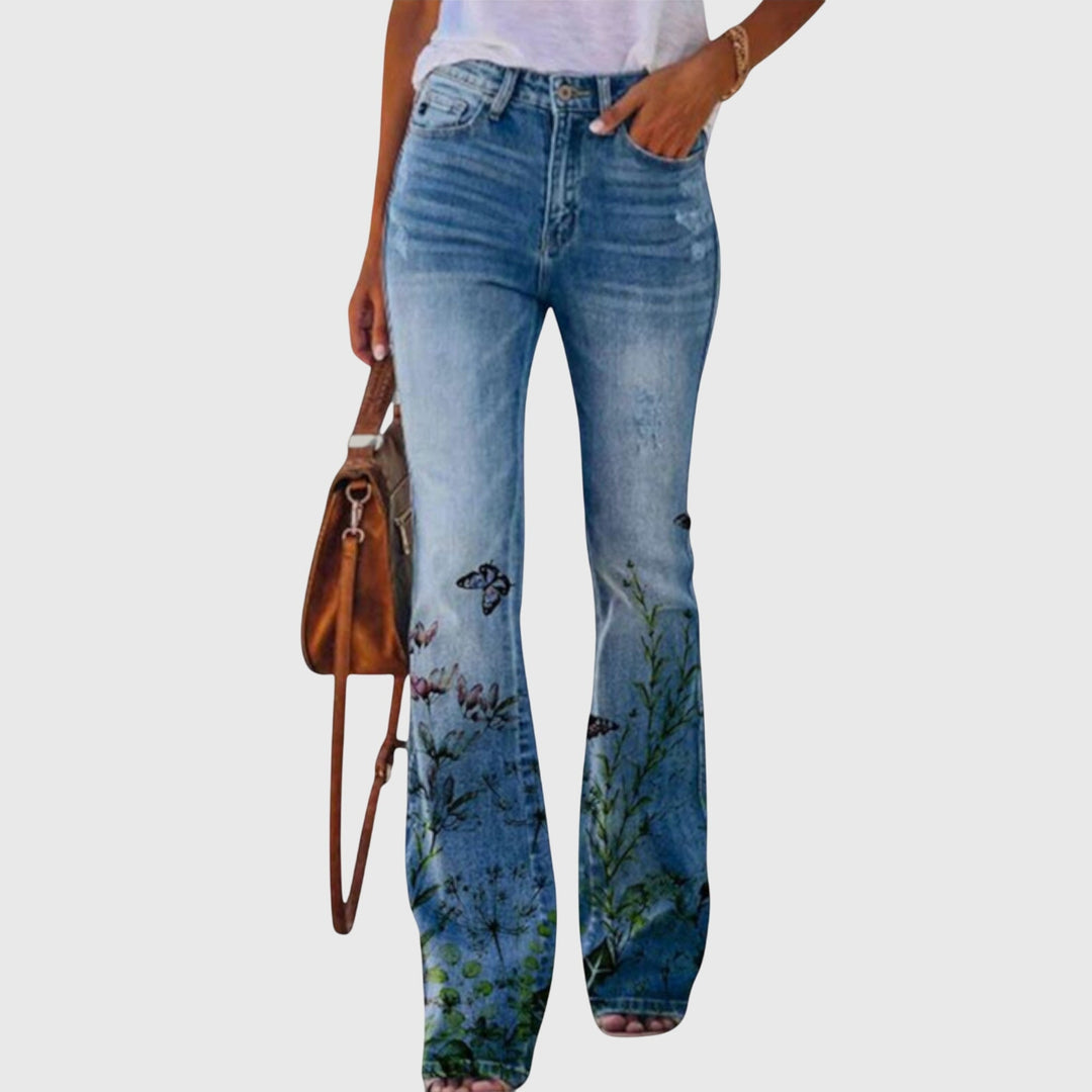 Pantalon femme chic à motif floral évasé, idéal pour une tenue décontractée et élégante en été.