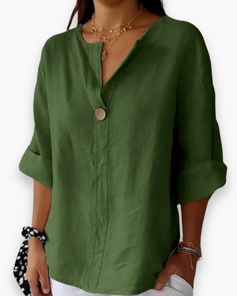 Blouse élégante femme à col V, coupe ample, offrant confort et style. Idéale pour la mode printemps-été.