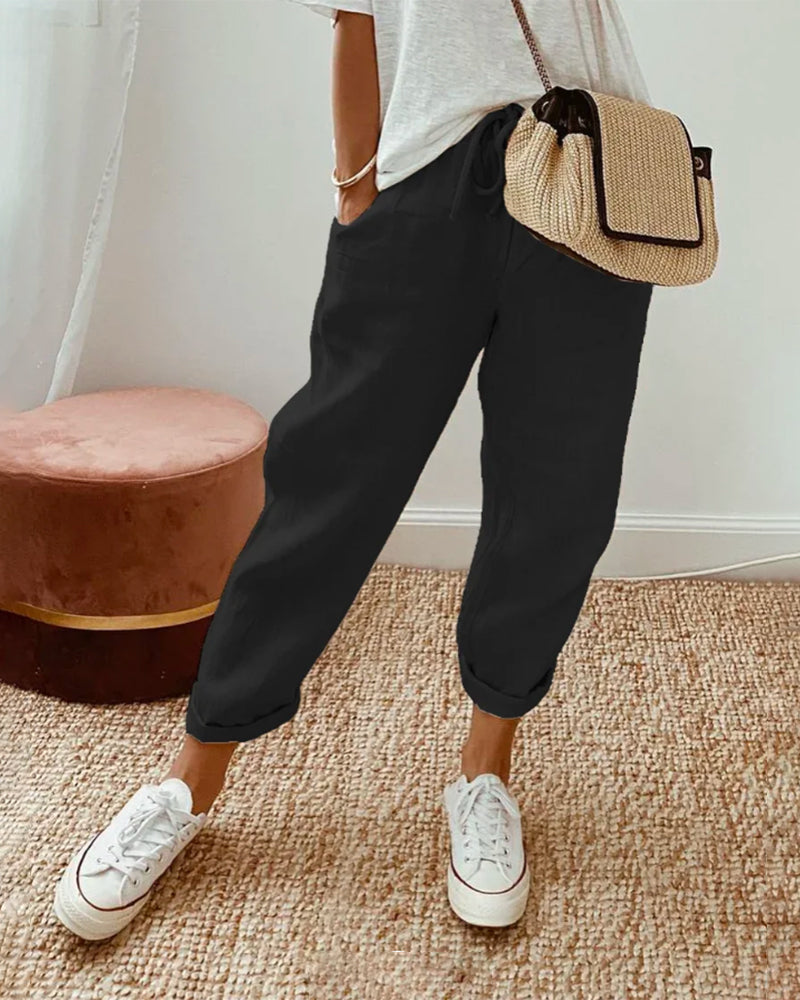 Pantalon lin femme, coupe fluide, taille ajustable. Confort quotidien chic pour le printemps et l'été.