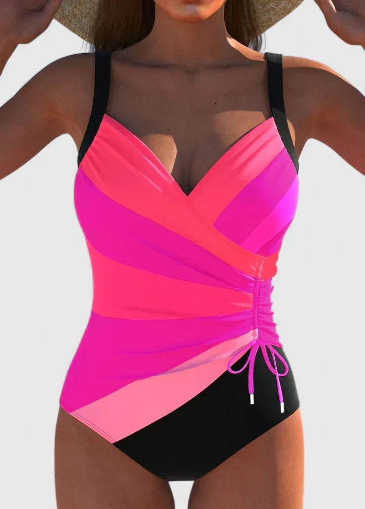 Maillot de bain une pièce rayé moderne pour femme. Parfait pour un look chic en vacances d'été.