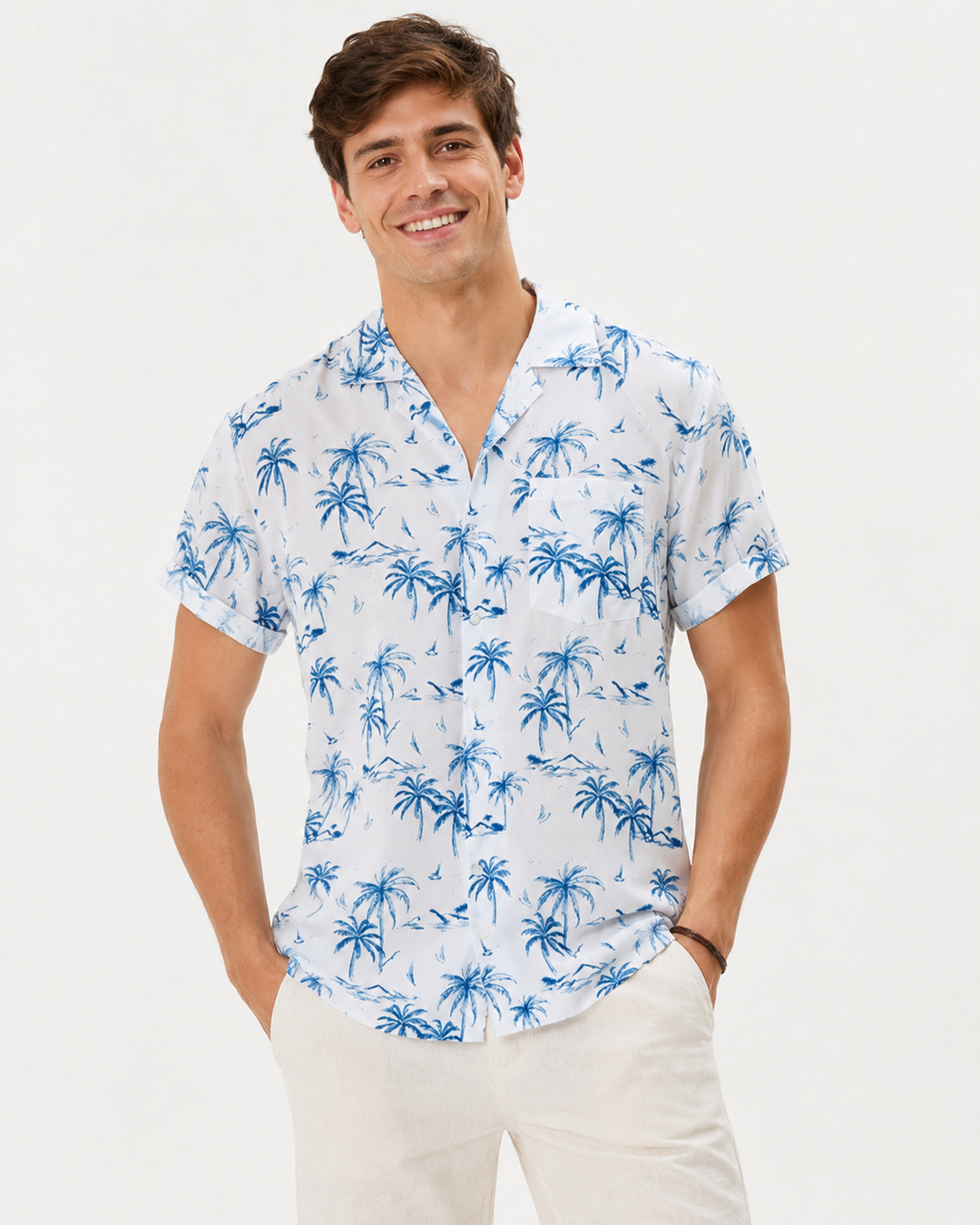 Chemise hawaïenne homme à manches courtes, imprimé palmiers et cocotiers, idéale pour l'été et la plage.