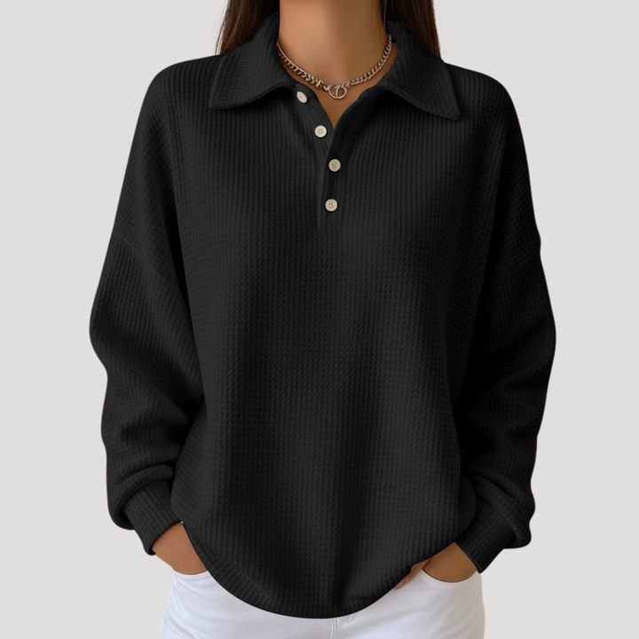 Pull femme chic en maille gaufrée, col polo moderne. Ce pull offre confort et élégance pour la mode femme.