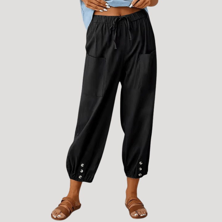 Pantalon taille haute femme, coupe décontractée et confortable. Chevilles ajustées pour un style casual mode.