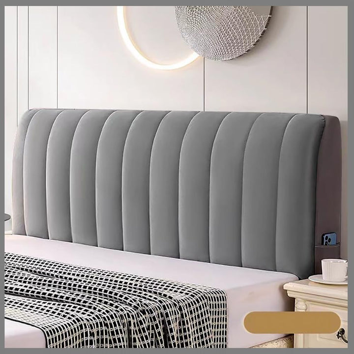 Housse de tête de lit en velours doux gris foncé, apportant confort et élégance moderne à votre chambre.