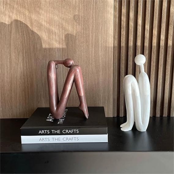 Serre-livres décoratif moderne en métal 'Forma', idéal pour organiser et embellir bureau ou salon avec un design chic.