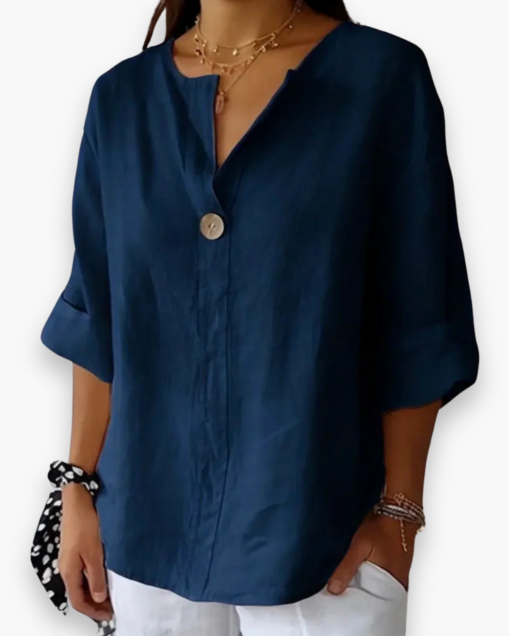 Blouse femme ample décontractée, couleur unie, idéale pour un look chic et confortable en été.