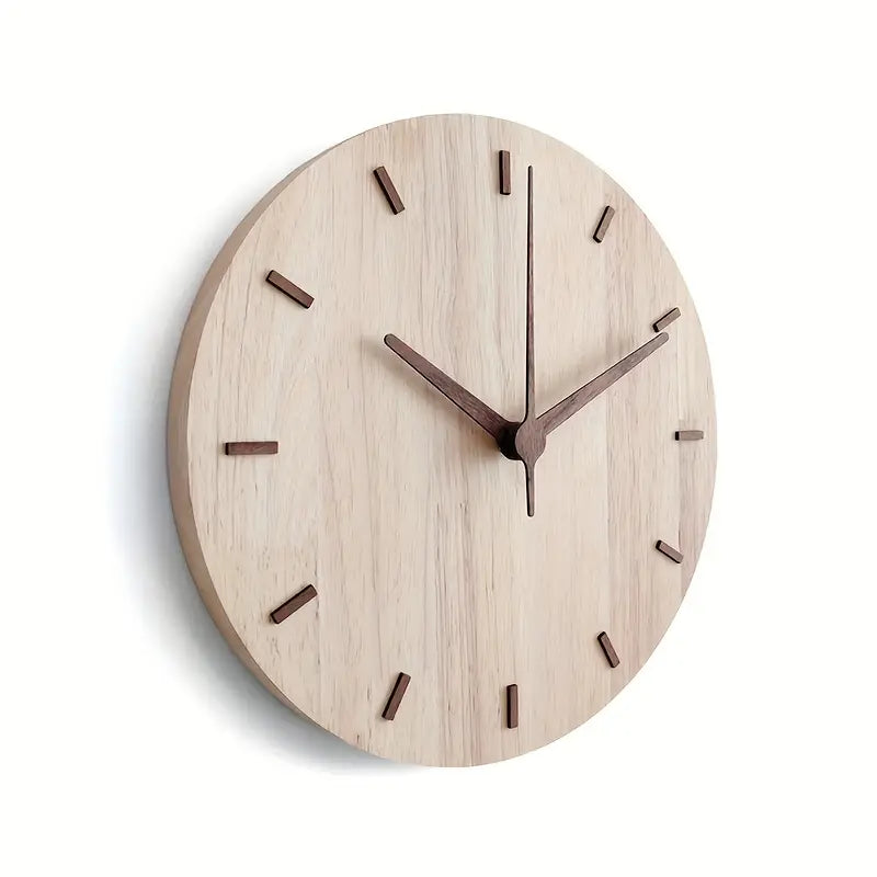Horloge murale moderne en noyer, style épuré. Idéale pour apporter une touche de design scandinave à la maison.