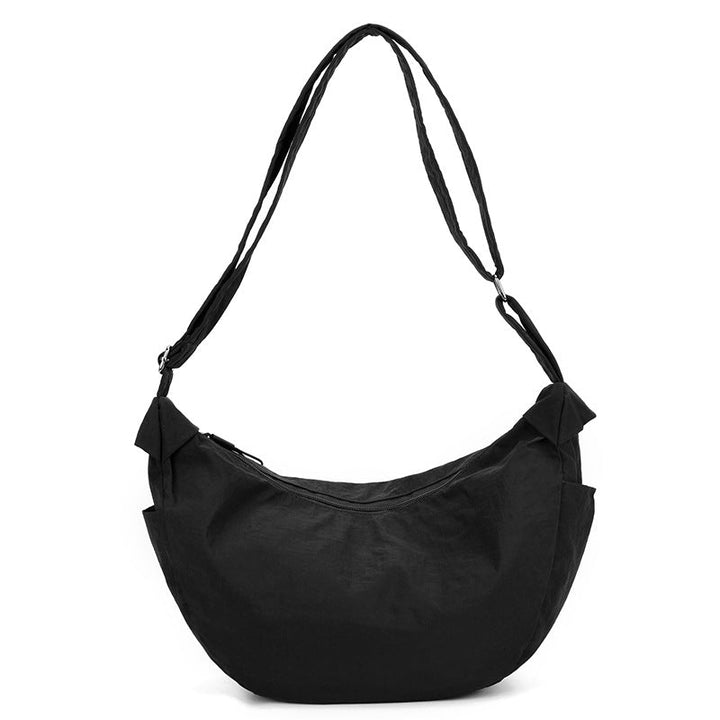 Sac demi-lune élégant pour femme, bandoulière ajustable. Idéal comme accessoire mode avec sa grande capacité.