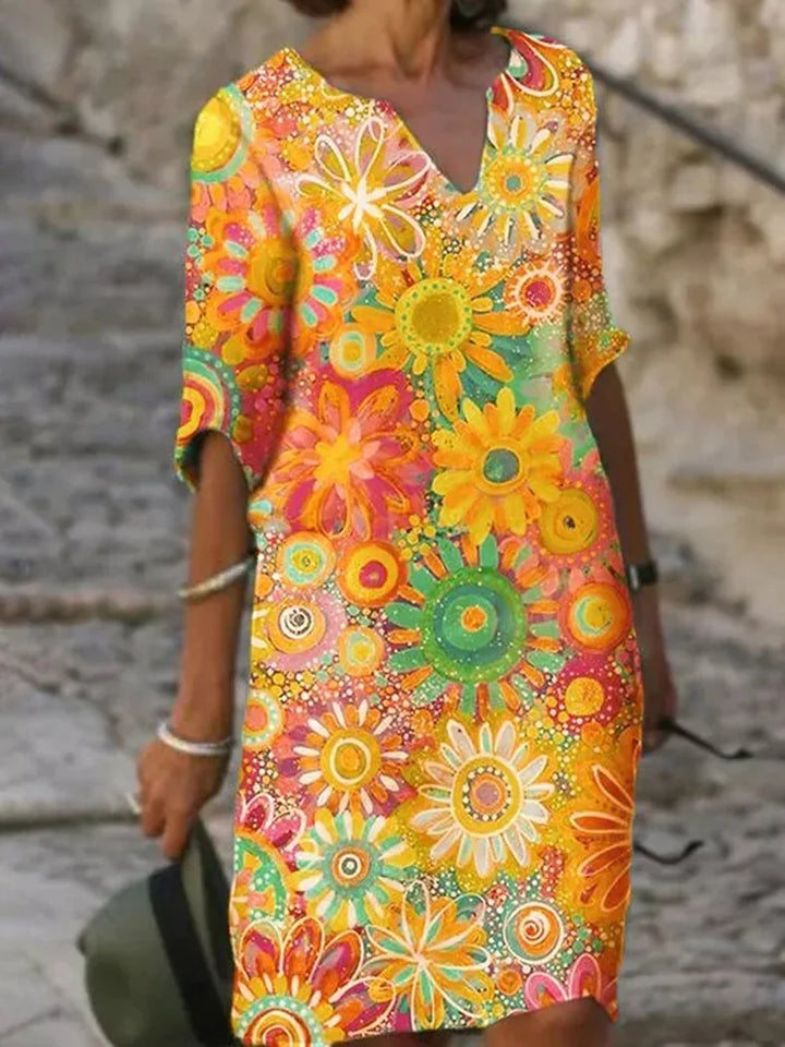Élégante robe d'été bohème à motif floral, coupe fluide, parfaite pour une allure chic et printanière.