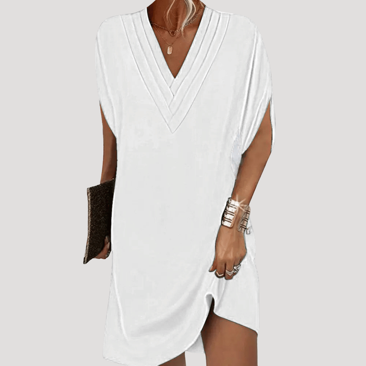 Robe polyvalente femme, courte et fluide avec col V, pour un look confortable et élégant en toute occasion.