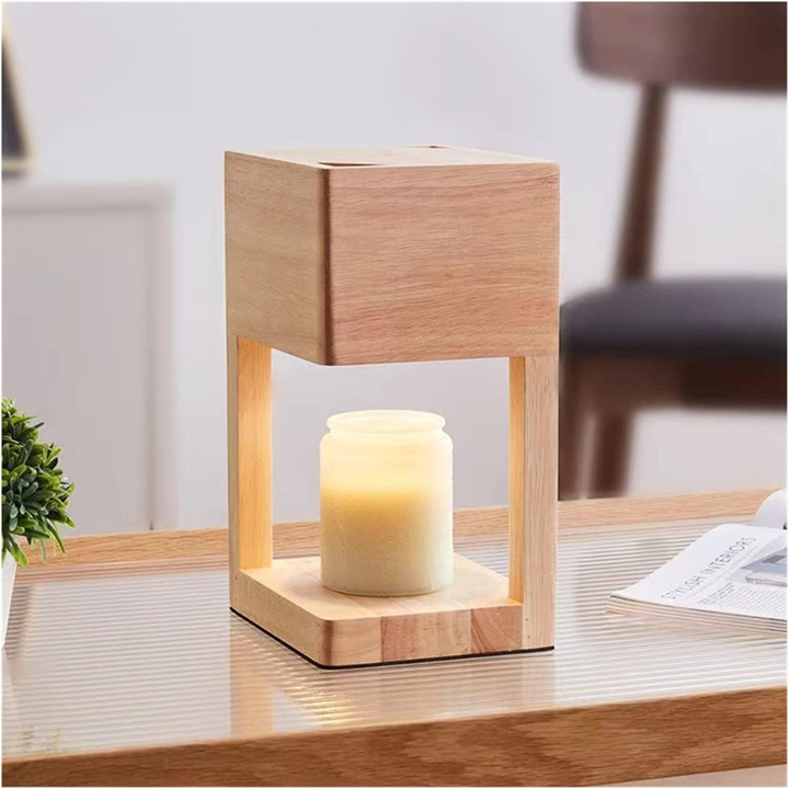 Lampe réchauffe-bougie au design scandinave, parfaite pour diffuser un parfum d'ambiance relaxant.