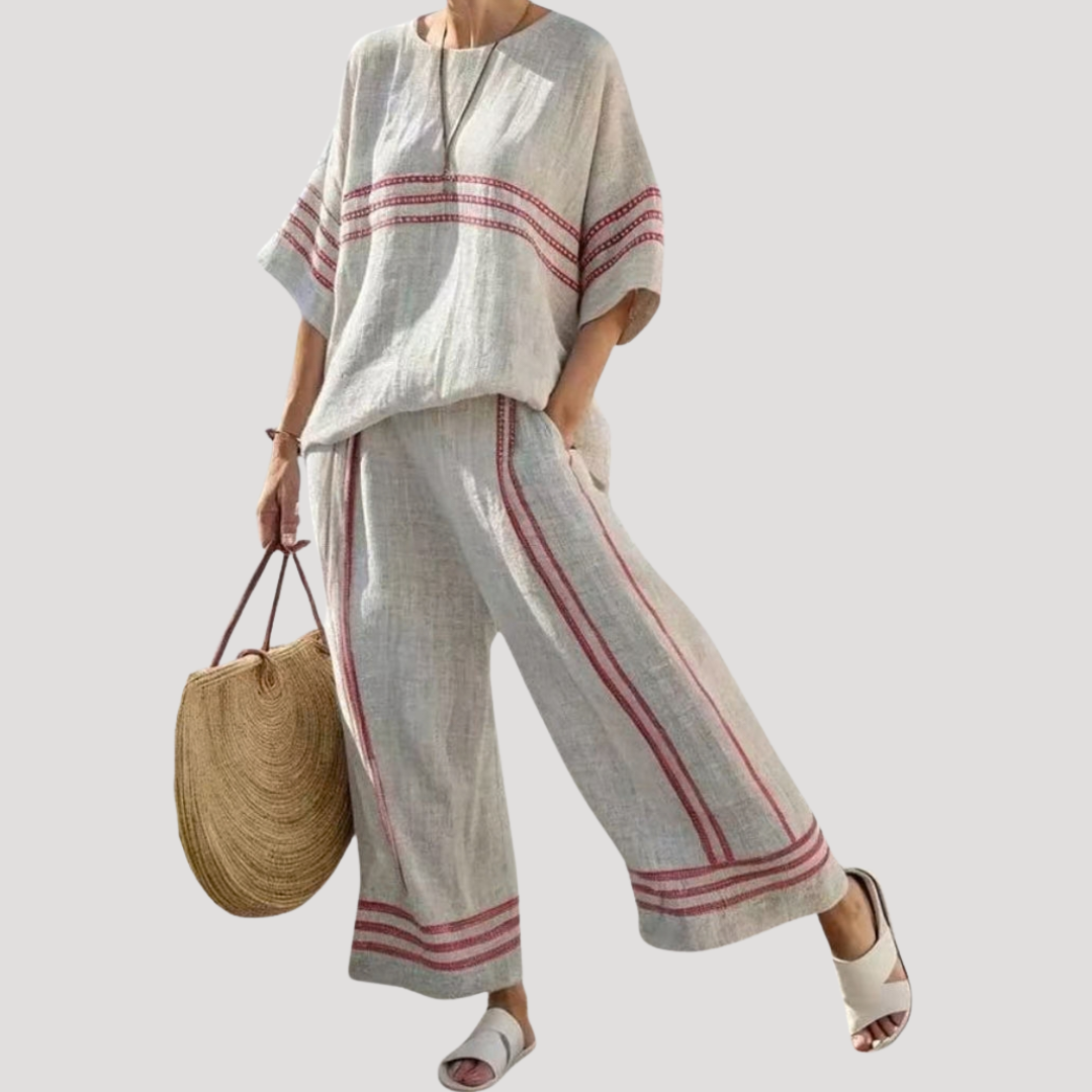 Duo décontracté femme: tunique légère et pantalon large fluide, parfait pour une tenue estivale décontractée.
