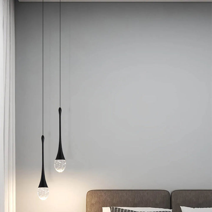 Suspension luminaire en verre Vetra, apporte chaleur et modernité, sublime l'ambiance de votre intérieur.