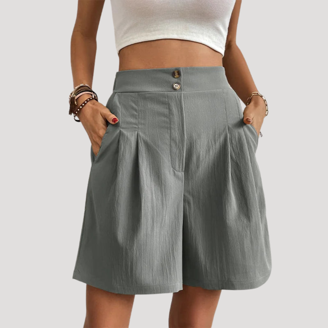 Short femme élégant et plissé, à taille haute, parfait pour un style estival décontracté-chic.