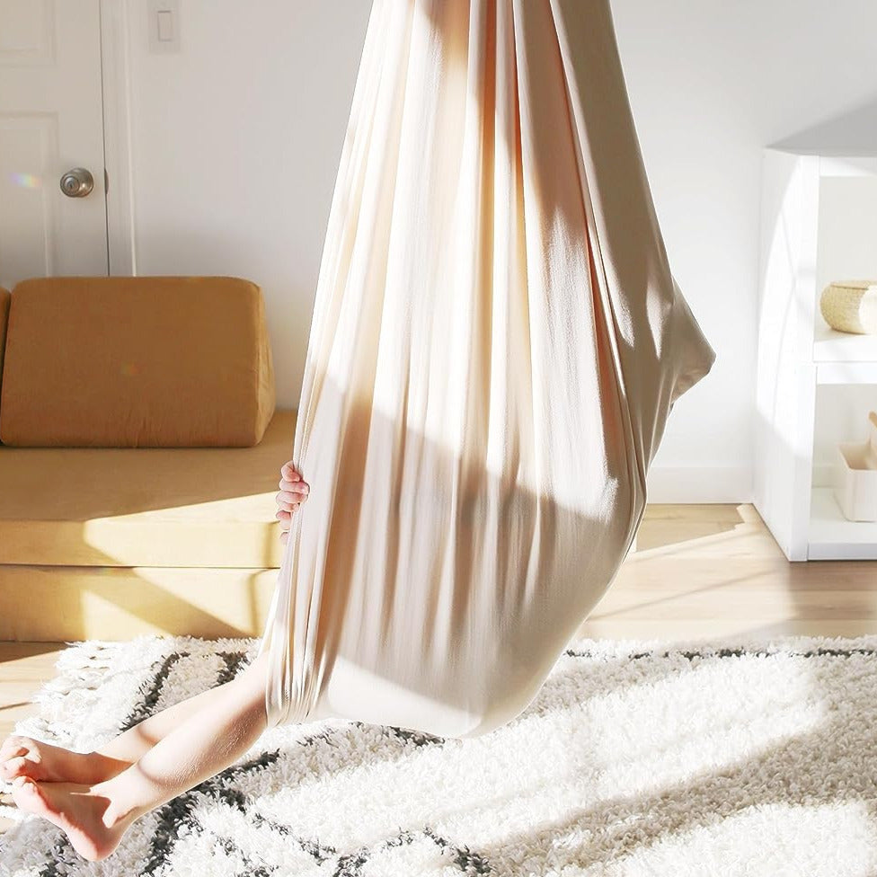 Hamac sensoriel ZenSwing, enveloppant, pour calmer et détendre les enfants, idéal pour la thérapie.