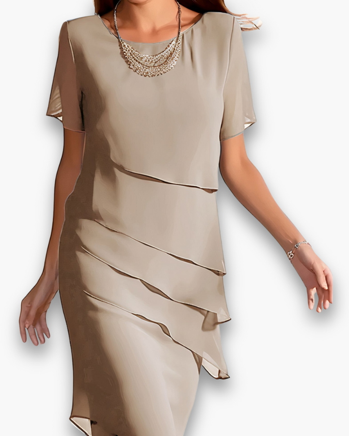 Robe femme de cérémonie midi, élégante et chic. Parfaite pour une soirée ou événement habillé. Vêtement printemps/été.